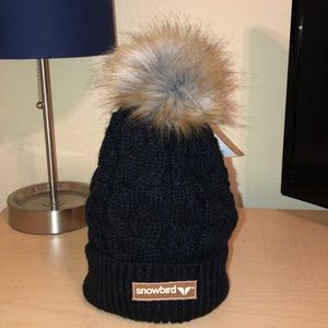 black knitted beanie with pom pom